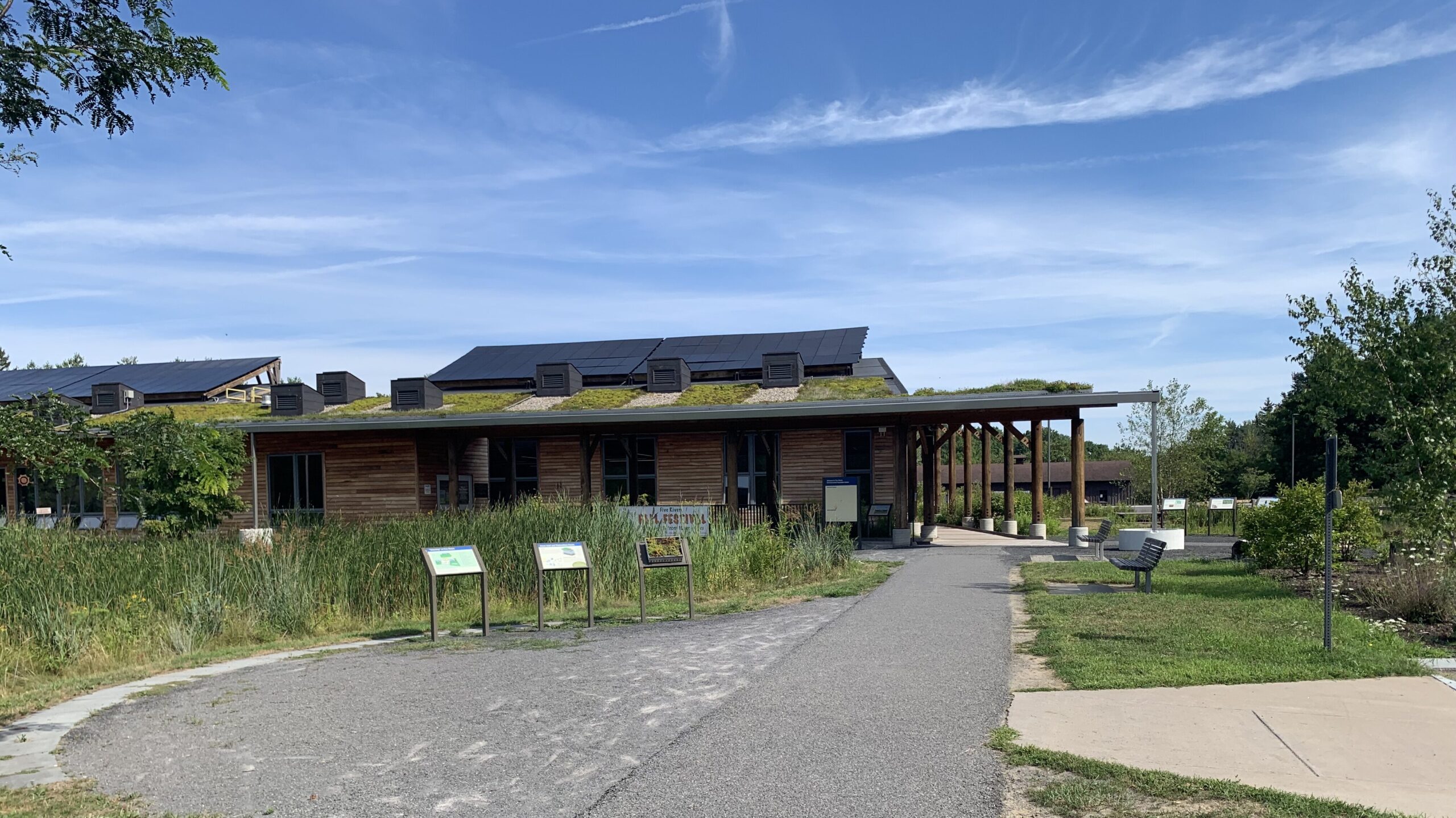 Education Center at Five Rivers with a living green roof and solar panels on the roof.